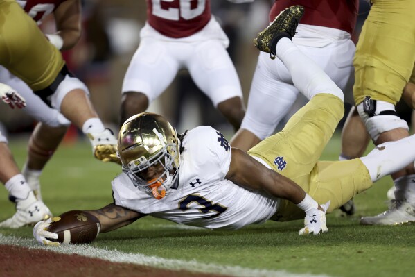 Audric Estim scores 4 TDs No. 17 Notre Dame routs Stanford 56 23